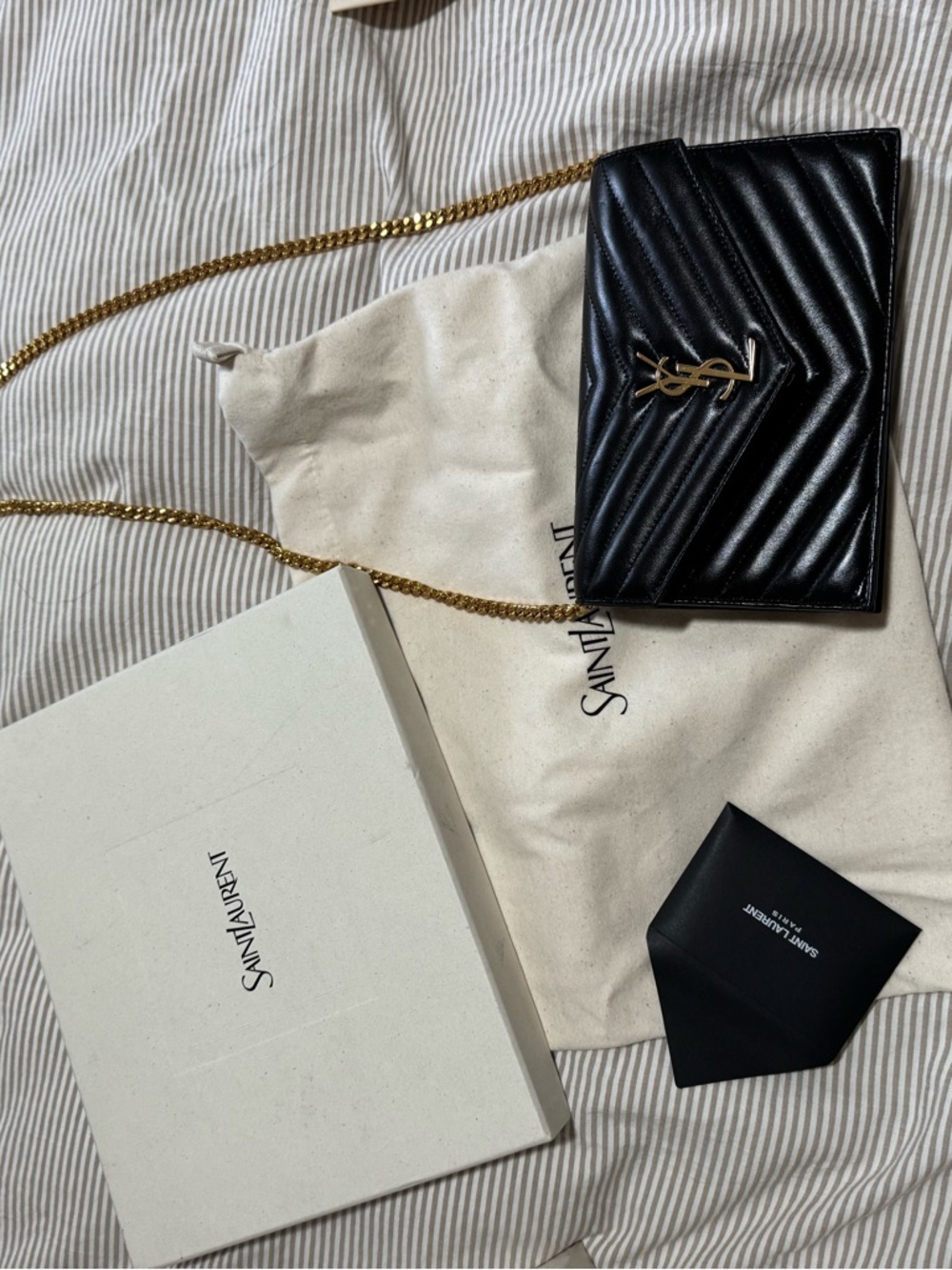 Saint Laurent Cassandre Envelope
Chain Wallet with Gold YSL Chain